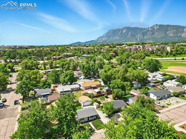 1137 Pando Ave, Colorado Springs, CO 80905 - aerial perspective of suburban area featuring a mountain backdrop