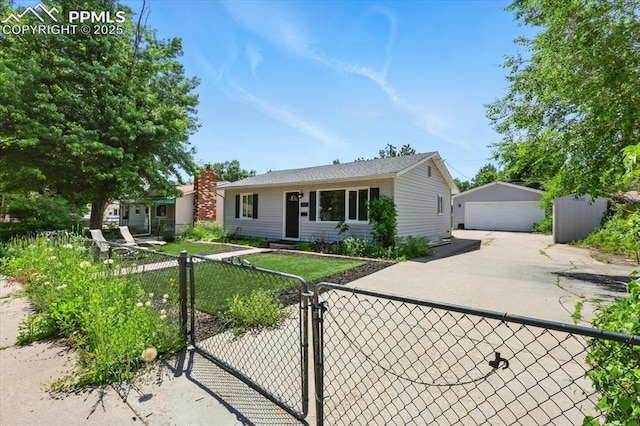 1137 Pando Ave, Colorado Springs, CO 80905 - ranch-style home with a detached garage, an outbuilding, and a gate