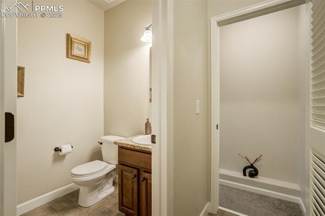 10280 Abrams Dr, Colorado Springs, CO 80925 - bathroom with toilet and vanity