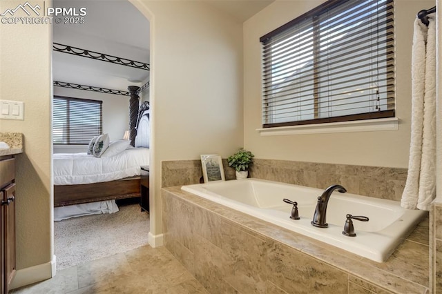 10280 Abrams Dr, Colorado Springs, CO 80925 - full bath featuring ensuite bathroom, a bath, and vanity