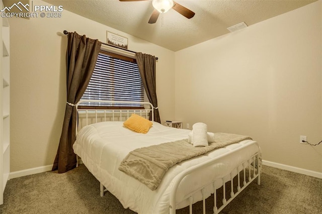 10280 Abrams Dr, Colorado Springs, CO 80925 - bedroom with carpet, a textured ceiling, and a ceiling fan