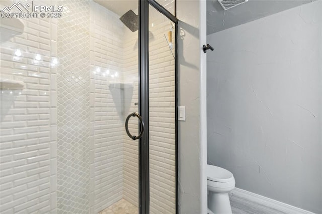 7416 Crow Ct, Colorado Springs, CO 80908 - full bathroom featuring a stall shower and toilet
