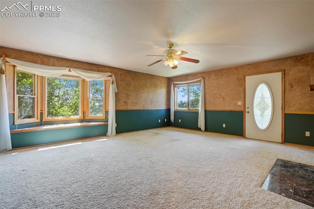 2550 Slocum Rd, Peyton, CO 80831 - carpeted entryway with healthy amount of natural light and a ceiling fan