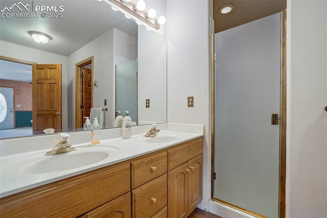 2550 Slocum Rd, Peyton, CO 80831 - bathroom featuring double vanity and a shower stall