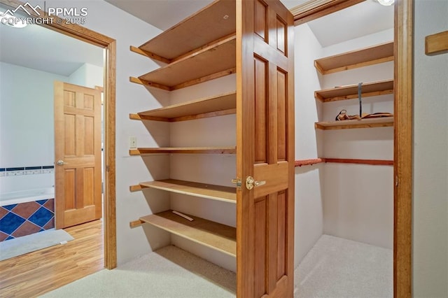 2550 Slocum Rd, Peyton, CO 80831 - spacious closet featuring wood finished floors