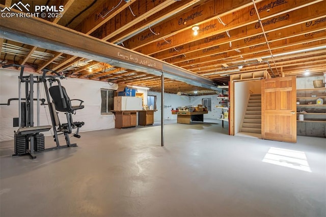 2550 Slocum Rd, Peyton, CO 80831 - unfinished below grade area featuring stairway and electric panel