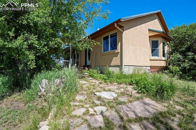 2550 Slocum Rd, Peyton, CO 80831 - view of property exterior with stucco siding