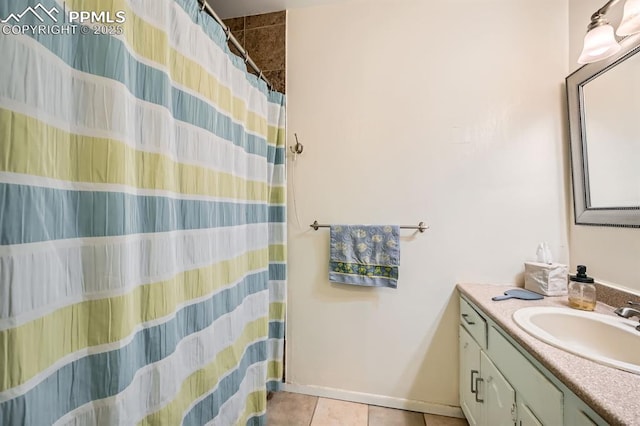 376 Gardenia Rd, Woodland Park, CO 80863 - full bathroom featuring vanity, tile patterned floors, and curtained shower