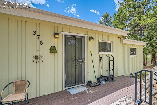 376 Gardenia Rd, Woodland Park, CO 80863 - doorway to property featuring a wooden deck