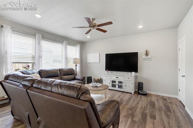 8101 Goldenray Pl, Colorado Springs, CO 80908 - living area with a ceiling fan, wood finished floors, and recessed lighting