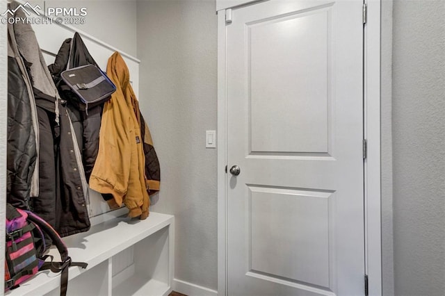 8101 Goldenray Pl, Colorado Springs, CO 80908 - mudroom featuring a textured wall