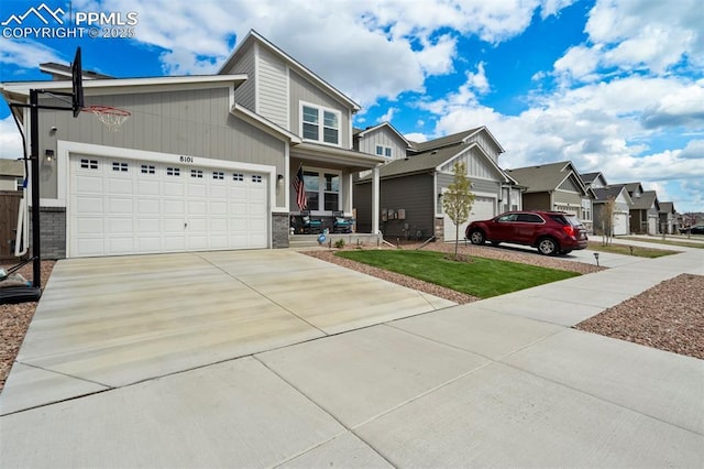 8101 Goldenray Pl, Colorado Springs, CO 80908 - view of front of property featuring brick siding, a garage, concrete driveway, and a porch