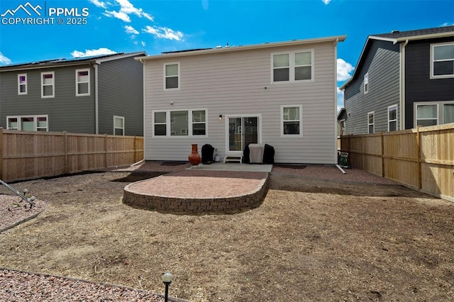 8101 Goldenray Pl, Colorado Springs, CO 80908 - rear view of house featuring a patio area and a fenced backyard