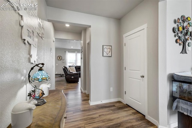 8101 Goldenray Pl, Colorado Springs, CO 80908 - hall with wood finished floors and recessed lighting