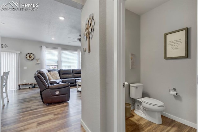8101 Goldenray Pl, Colorado Springs, CO 80908 - bathroom with ceiling fan, wood finished floors, and recessed lighting