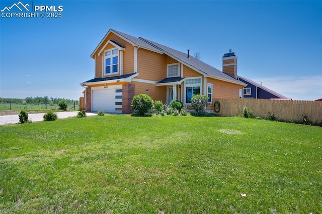 9503 Brisk Breeze Ct, Colorado Springs, CO 80925 - view of front of house featuring a garage, a chimney, and driveway