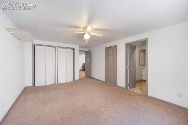 9503 Brisk Breeze Ct, Colorado Springs, CO 80925 - unfurnished bedroom with carpet floors, ceiling fan, connected bathroom, and a closet