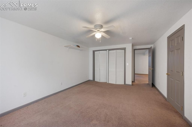9503 Brisk Breeze Ct, Colorado Springs, CO 80925 - unfurnished bedroom featuring carpet flooring, a closet, ceiling fan, and a textured ceiling