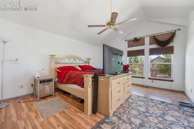 9503 Brisk Breeze Ct, Colorado Springs, CO 80925 - bedroom featuring light wood-style flooring, high vaulted ceiling, and a ceiling fan