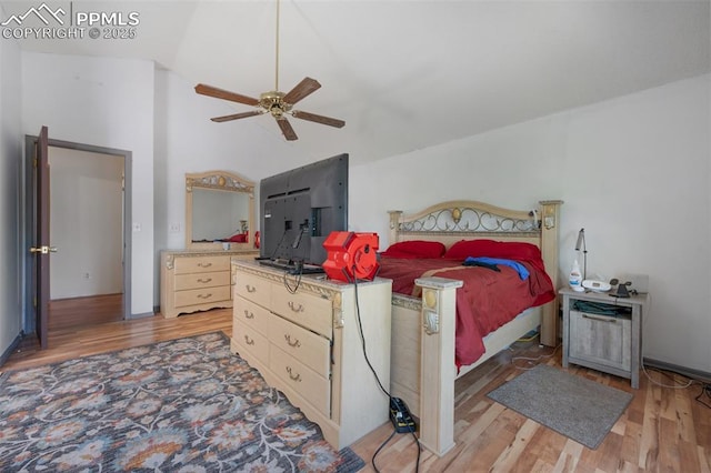 9503 Brisk Breeze Ct, Colorado Springs, CO 80925 - bedroom with light wood-type flooring, lofted ceiling, and ceiling fan