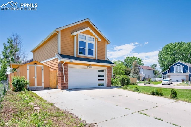 9503 Brisk Breeze Ct, Colorado Springs, CO 80925 - view of front facade featuring a garage, brick siding, and driveway