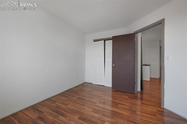 9503 Brisk Breeze Ct, Colorado Springs, CO 80925 - unfurnished bedroom with wood finished floors and a closet