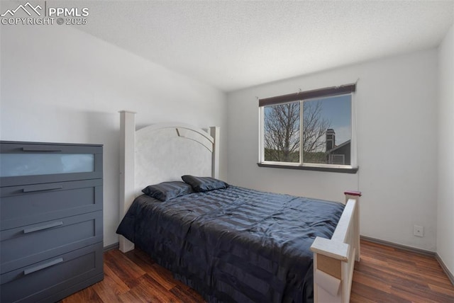 9503 Brisk Breeze Ct, Colorado Springs, CO 80925 - bedroom with dark wood-style floors