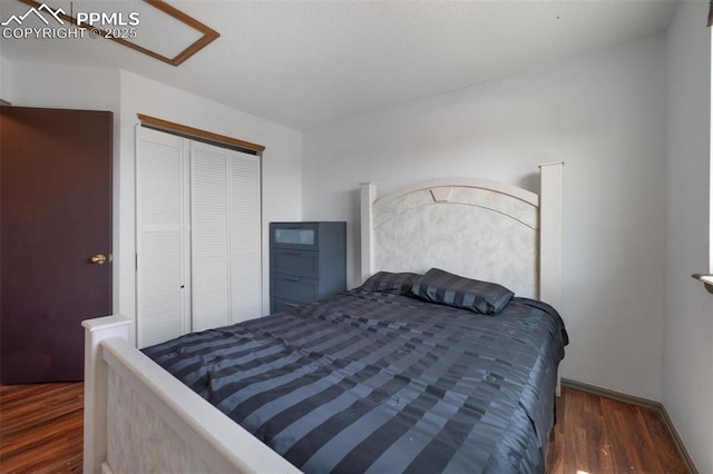 9503 Brisk Breeze Ct, Colorado Springs, CO 80925 - bedroom featuring wood finished floors and a closet