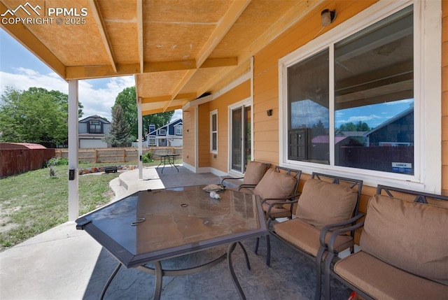 9503 Brisk Breeze Ct, Colorado Springs, CO 80925 - fenced backyard with a patio area