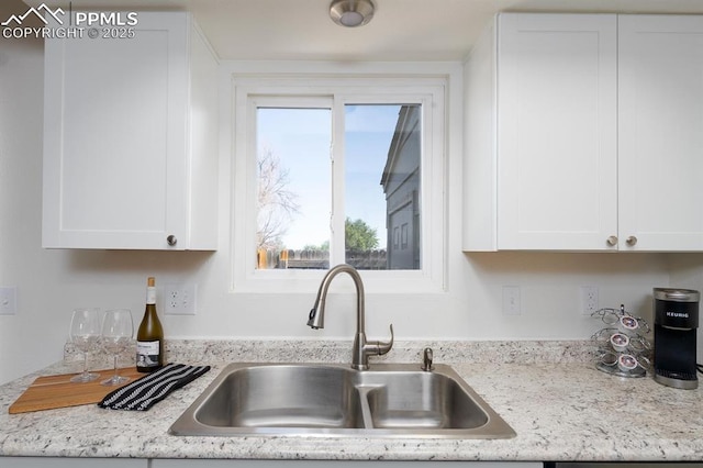 1363 Soaring Eagle Dr, Colorado Springs, CO 80915 - kitchen with white cabinetry