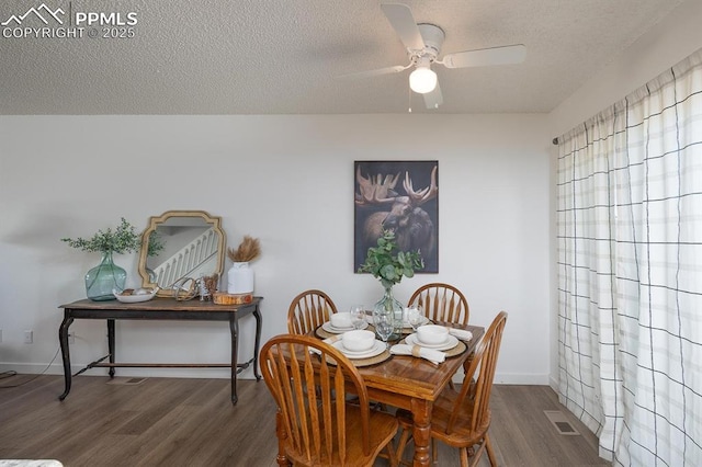 1363 Soaring Eagle Dr, Colorado Springs, CO 80915 - dining space featuring a textured ceiling, wood finished floors, and ceiling fan