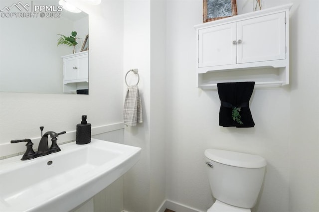 1363 Soaring Eagle Dr, Colorado Springs, CO 80915 - half bath featuring a sink and toilet