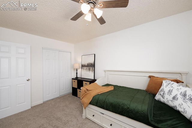 1363 Soaring Eagle Dr, Colorado Springs, CO 80915 - bedroom with carpet flooring, a closet, a textured ceiling, and ceiling fan