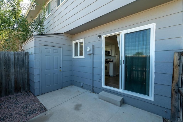 1363 Soaring Eagle Dr, Colorado Springs, CO 80915 - entrance to property with a patio area