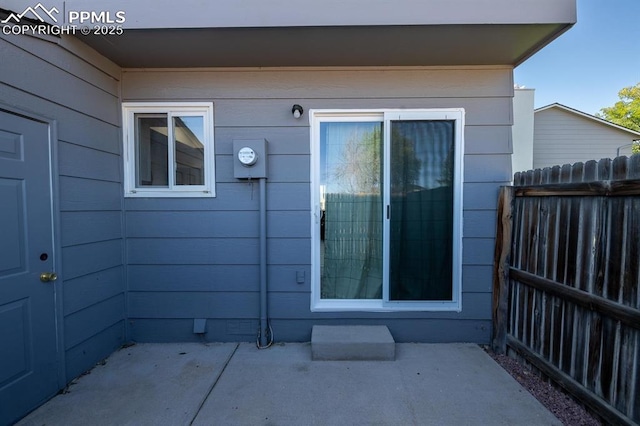 1363 Soaring Eagle Dr, Colorado Springs, CO 80915 - view of exterior entry featuring a patio