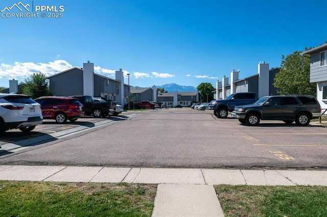 1363 Soaring Eagle Dr, Colorado Springs, CO 80915 - view of asphalt road with a residential view and a mountain view