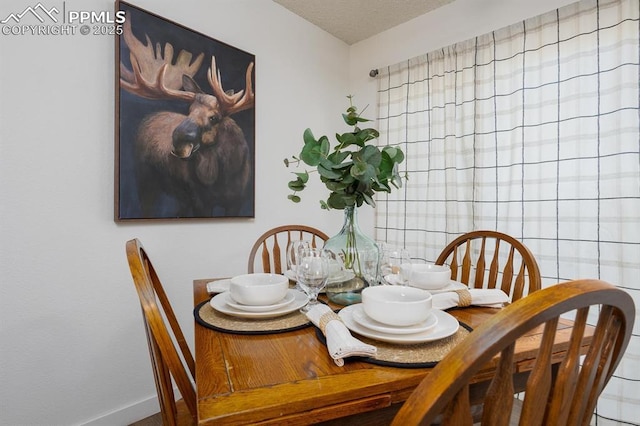 1363 Soaring Eagle Dr, Colorado Springs, CO 80915 - dining space with baseboards