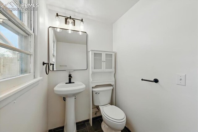 1314 Pioneer Rd, Colorado Springs, CO 80907 - half bathroom featuring toilet