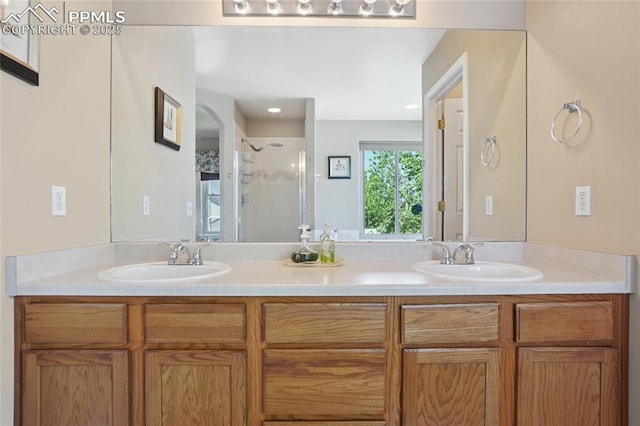 392 Pyrite Ter, Colorado Springs, CO 80905 - full bathroom with double vanity and a stall shower