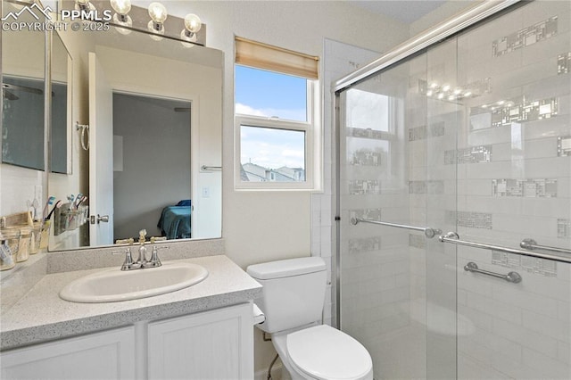 6355 Casual Dr, Colorado Springs, CO 80923 - bathroom with ensuite bathroom, vanity, and a shower stall
