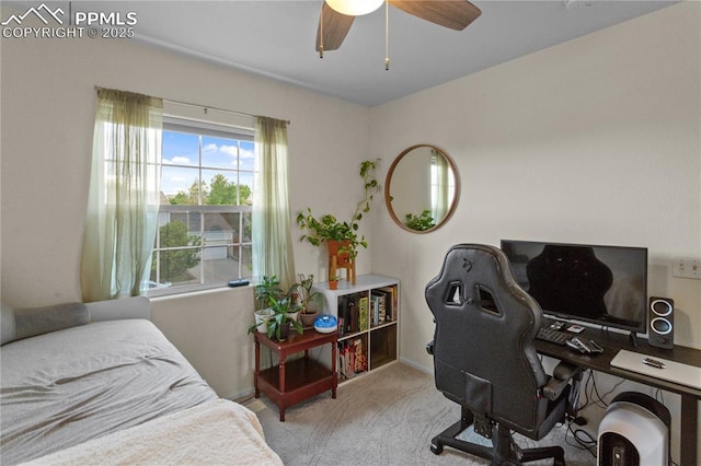 6355 Casual Dr, Colorado Springs, CO 80923 - carpeted bedroom with an office area and a ceiling fan