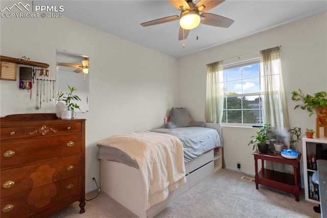 6355 Casual Dr, Colorado Springs, CO 80923 - bedroom with light carpet and a ceiling fan