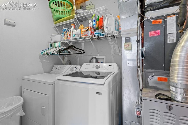 6355 Casual Dr, Colorado Springs, CO 80923 - laundry room with washing machine and clothes dryer and heating unit
