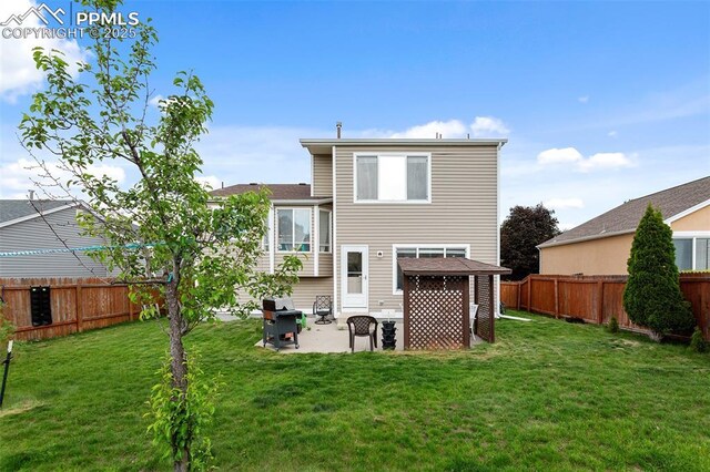 6355 Casual Dr, Colorado Springs, CO 80923 - rear view of house with a patio and a fenced backyard