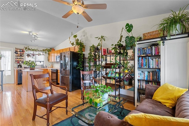 6355 Casual Dr, Colorado Springs, CO 80923 - living area featuring ceiling fan, light wood-style flooring, and lofted ceiling