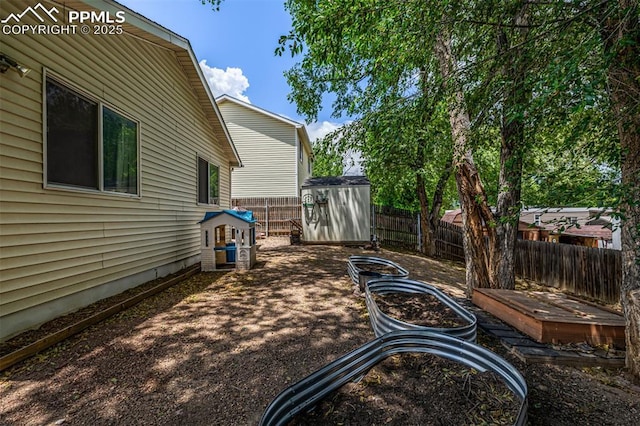 1013 Maxwell St, Colorado Springs, CO 80906 - fenced backyard with a storage unit