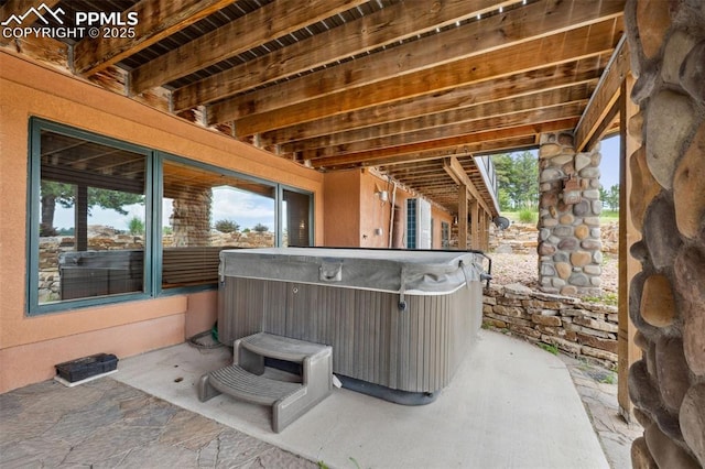 16575 Dancing Wolf Way, Colorado Springs, CO 80908 - view of patio featuring a hot tub