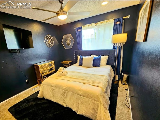 4110 Novia Dr, Colorado Springs, CO 80911 - carpeted bedroom with a textured ceiling and a ceiling fan