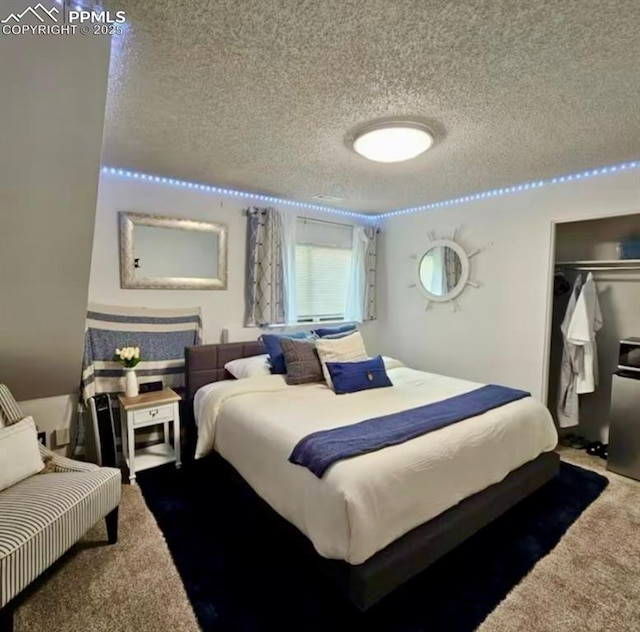 4110 Novia Dr, Colorado Springs, CO 80911 - carpeted bedroom featuring a textured ceiling and a closet