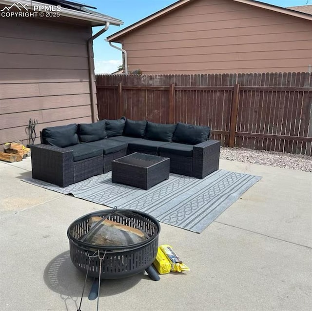 4110 Novia Dr, Colorado Springs, CO 80911 - fenced backyard featuring an outdoor living space and a patio area